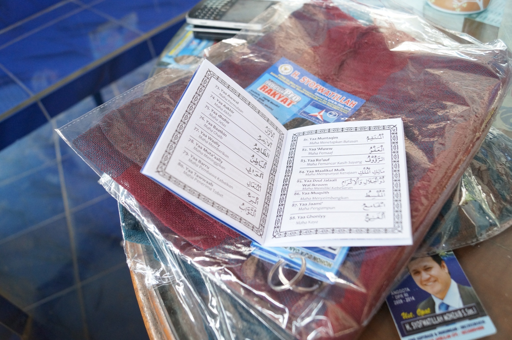 A headscarf, a prayer book, and some mementoes: a typical getting-to-know-you gift - Edward Aspinall 4. Aspinall - Money politics - 1